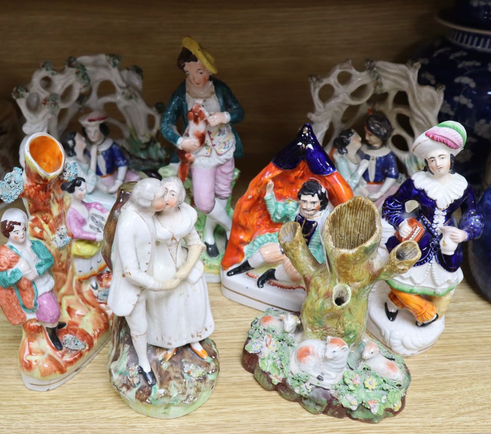 Eight Staffordshire pottery figures and groups